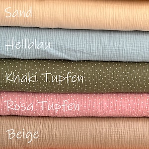 Puede incluir: Siete capas apiladas de tela de muselina arrugada en varios colores y patrones. Los colores incluyen crudo, arena, azul claro, caqui con puntos blancos, rosa con puntos blancos, beige y naranja ne&oacute;n, cada uno etiquetado con su nombre.