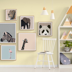 May include: A yellow wall with a white chair and a white bookshelf. The wall is decorated with framed animal prints of a lion, elephant, zebra, giraffe, flamingo, and panda. The bookshelf has wooden mountain-shaped decorations and plants.