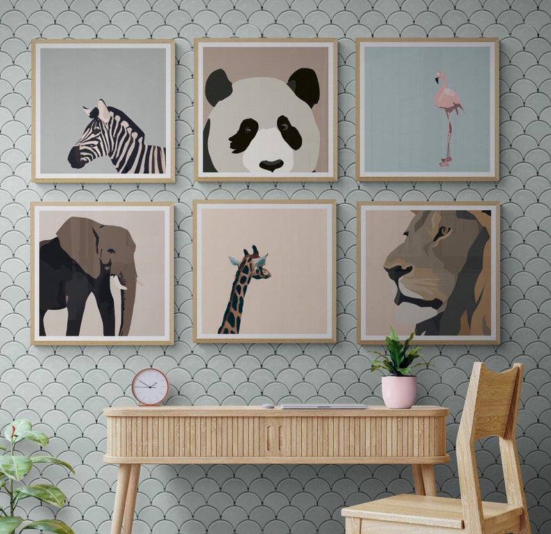 May include: A set of six framed prints featuring various animal illustrations. The prints are in a modern style with a white background and black outlines. The animals include a zebra, a panda, a flamingo, an elephant, a giraffe, and a lion.
