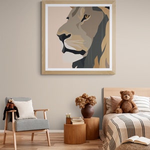 May include: A framed print of a lion's face in a minimalist style. The lion's face is depicted in shades of brown, beige, and black, with a light pink background. The print is hanging on a light beige wall above a wooden bed frame.