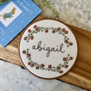 Custom Name Embroidery Hoop — Hand Embroidered Floral Script | Nursery Wall Art