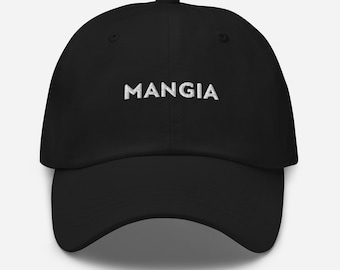 May include: Black baseball cap with the word "MANGIA" embroidered in white. The cap features a curved peak and a rounded crown. The hat is made of a soft material.