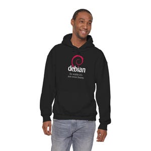 May include: Black hooded sweatshirt with the word "debian" in white text and a pink swirl design. Below the word "debian" is the text "So stable it's not even funny."