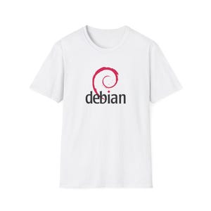 May include: White t-shirt featuring the Debian logo. The logo is a stylized red swirl above the word "debian" in black, centered on the chest. The shirt has a crew neck and short sleeves.