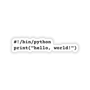 Może przedstawiać: Naklejka z tekstem "#!/bin/python print("hello, world!")" w czarnym kolorze na białym tle.