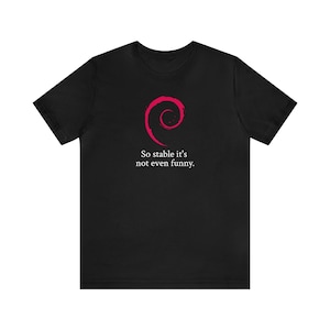 May include: Black t-shirt featuring a red Linux logo and the text "So stable it's not even funny."