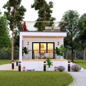 May include: A modern, white two-story house with a rooftop deck, surrounded by lush greenery. The house features a balcony with seating, a red decorative vase, and a pathway leading to the entrance. The exterior is decorated with plants and lights.