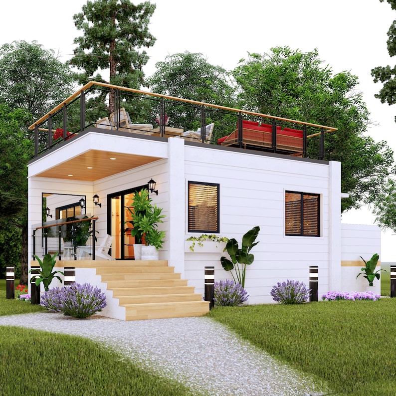 May include: A modern, two-story white house with a rooftop deck. The house features black-framed windows, a wooden staircase, and a pathway leading to the entrance. Landscaping includes green grass, bushes, and trees, creating a serene outdoor setting.
