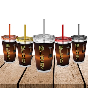May include: Five clear plastic tumblers with black and yellow graphics that say "BLOXXY". The tumblers are arranged in a row on a wooden surface. Each tumbler has a different colored straw.