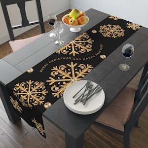 Christmas table runner – Black table runner with golden snowflakes and the saying “Merry Christmas and a Happy New Year”