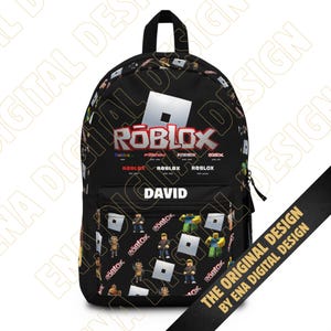 May include: A black backpack featuring a Roblox logo and various character graphics. The front pocket displays the name DAVID in white capital letters. The design includes multiple Roblox logos and small character figures printed across the fabric.