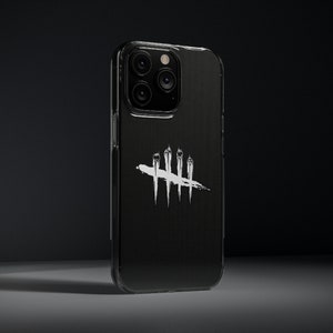Puede incluir: Funda transparente para tel&eacute;fono con parte trasera negra. Tiene un gr&aacute;fico blanco de cuatro l&iacute;neas verticales con una l&iacute;nea horizontal que las atraviesa. La funda est&aacute; sobre un fondo oscuro.