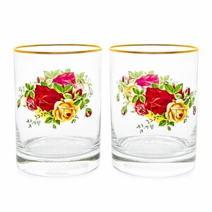 May include: Two clear glass tumblers featuring a floral design of red and yellow roses with green leaves. Each glass has a thin gold rim around the top edge. The glasses are cylindrical with a flat base and smooth, transparent glass walls.