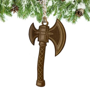 May include: A wooden axe ornament with a brown finish. The axe has a double-headed blade and a detailed handle.