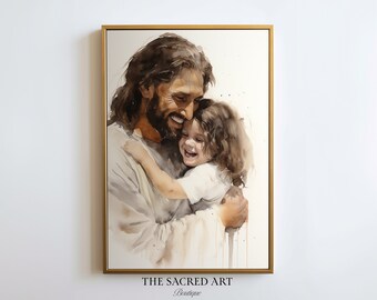 Può includere: Un dipinto ad acquerello di Gesù che abbraccia un bambino piccolo. Il dipinto è incorniciato in una cornice dorata e ha uno sfondo bianco. Il testo "THE SACRED ART Boutique" è stampato sotto il dipinto.