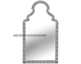May include: A decorative wall mirror with a unique arched top and a black and white striped frame. The mirror has a rectangular shape with a reflective surface. The text "BBCREATIVESDESIGNER" is printed on the mirror's surface.