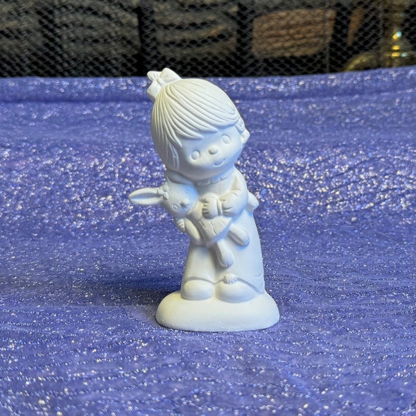 Unpainted bisque ceramic christmas figurines