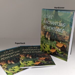 May include: Two paperback and one hardcover book with the title "Lila's Enchanting Adventures" and the subtitle "Unfolding Magical Secrets and Whimsical Adventures in the Enchanted Forest" by Talegazers. The cover features a colorful illustration of a village in a forest.
