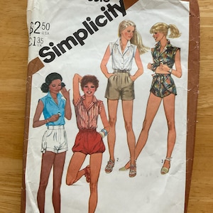 May include: A Simplicity 5516 sewing pattern envelope for young junior and teen sizes 5/6. The front features illustrations of four outfits including sleeveless collared shirts, blouses, and shorts with various patterns and solid colors.