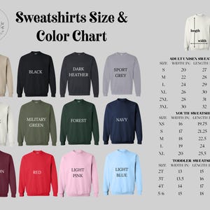 May include: A color chart for sweatshirts, featuring various colors like sand, black, dark heather, and light blue. The chart includes size measurements in inches for adult, youth, and toddler sizes, with width, length, and sleeve dimensions.