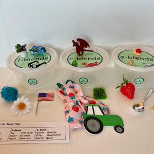 Blends Letter Tubs with Mini Objects - 6 objects per digraph, four blue labeled tubs, list of objects included - Great for Speech Therapy!