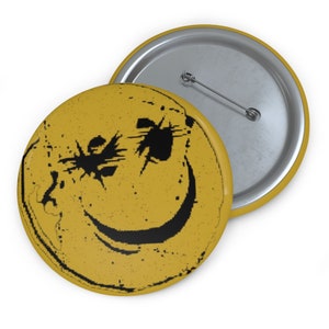 Pin Compatible with: Yellow Defaced Smiley pin, smiley pin, legion cosplay, susie cosplay, julie cosplay, frank cosplay, joey cosplay
