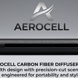 May include: A black Aerocell carbon fiber diffuser unit with a stealth design. The cylindrical unit has a rectangular scent slot. The image includes the Aerocell logo and text: "AEROCELL CARBON FIBER DIFFUSER UNIT."