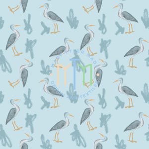 May include: A seamless pattern featuring gray herons on a light blue background. The herons are illustrated in a simple, stylized manner with brushstrokes. The background is a solid light blue color.