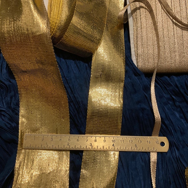 Antique gold French metal wired metallic ribbon trim, beautiful rich gold. Sold by the meter. Assorted widths. Perfect for presents
