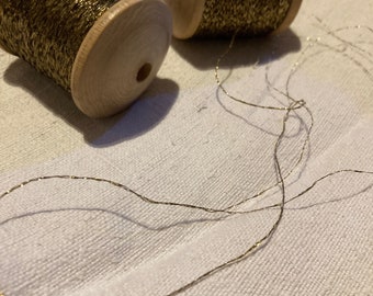 10 Meter Stick- oder Perlengarn aus den 1920er Jahren antik gold.