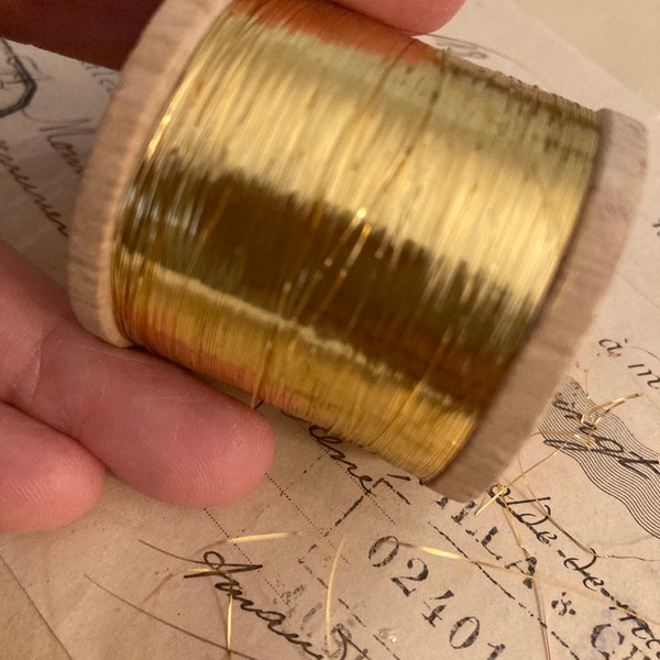 Whole spool of 1900s antique gold metal thread. Hundreds of meters
