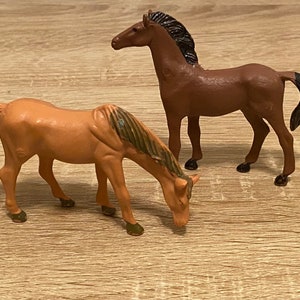 Hand painted Plastic Horses Set Of 2