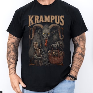 Dark Krampus Christmas shirt featuring the legendary holiday demon from Alpine folklore, perfect for fans of gothic fashion, pagan style, and alternative holiday apparel.