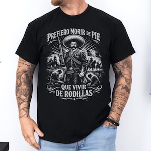 Emiliano Zapata unisex t-shirt featuring a powerful illustrated portrait of the Mexican revolutionary leader, inspired by the Mexican Revolution. This rebel spirit history shirt honors Emiliano Zapata’s fight for justice, land reform, and freedom, celebrating Latin heritage, revolutionary symbolism, and iconic Mexican history in a bold, striking design.