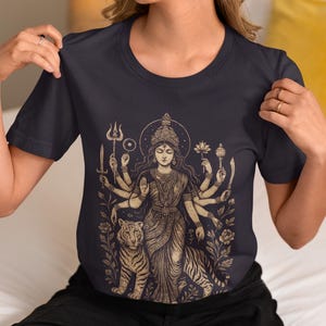 Hindu Goddess Durga T-shirt featuring a divine feminine design, perfect for spiritual lovers. Embrace the power of Durga with this occult mythology shirt. A unique dark goddess apparel piece for those who honor the sacred and mystical