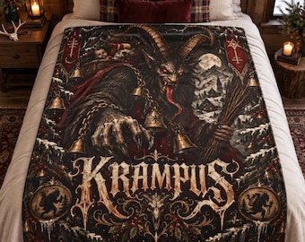May include: A rectangular fleece blanket featuring a dark, detailed illustration of Krampus with horns, a long tongue, and bells. The design includes a snowy village, red banners, and the word KRAMPUS in large, weathered, gothic-style lettering.