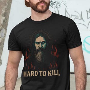 Mystical Rasputin t-shirt featuring a dark grunge occult illustration inspired by the legendary Russian mystic, with gothic aesthetic and esoteric symbolism. Funny dark humor shirt for history lovers, occult fans, and gothic style enthusiasts, designed with a vintage distressed look.