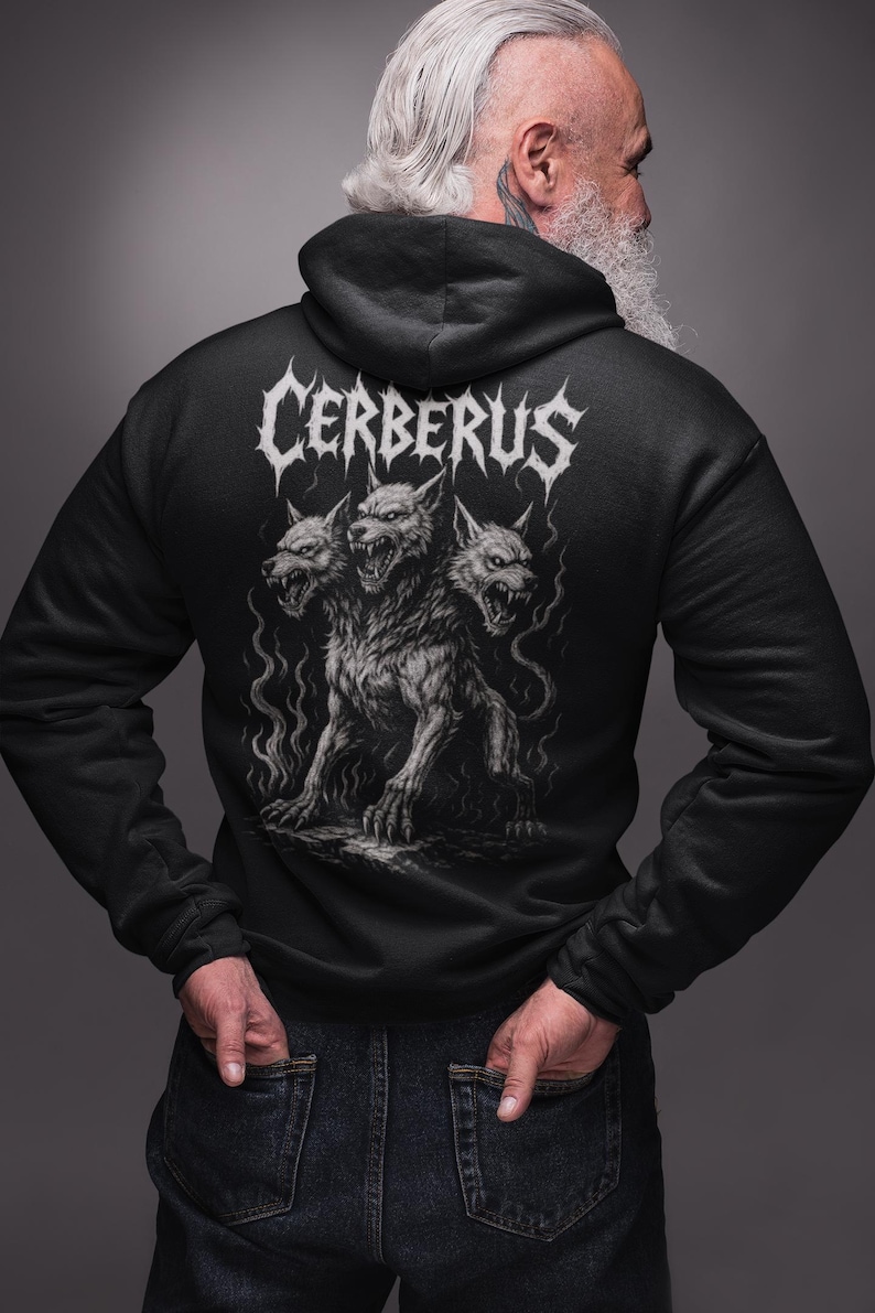 Cerberus Hoodie featuring a three-headed hellhound design inspired by Greek mythology. Gothic sweatshirt perfect for metalheads. Hades guardian graphic, ideal heavy metal gift for fans of dark fantasy and mythology