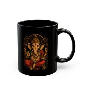 Black Ganesha Mug featuring Hindu Elephant God design, perfect for yoga lovers and spiritual gifts. Boho Indian graphic print. Available in 11oz and 15oz sizes. Ideal for tea or coffee, a unique addition to your collection