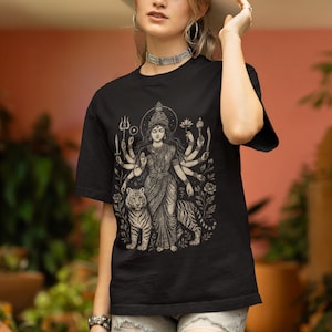 Hindu Goddess Durga T-shirt featuring a divine feminine design, perfect for spiritual lovers. Embrace the power of Durga with this occult mythology shirt. A unique dark goddess apparel piece for those who honor the sacred and mystical