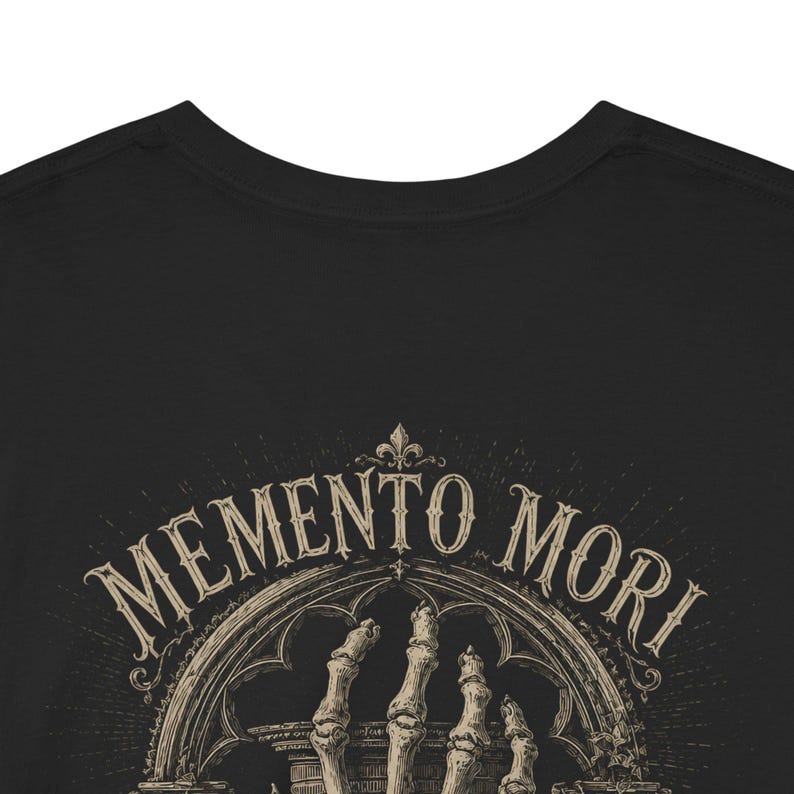 Memento Mori shirt featuring a vintage skeleton hand holding an hourglass, inspired by Stoic philosophy and mortality symbolism. Gothic t-shirt design with dark academia aesthetic, antique engraving style artwork, and memento mori theme. Perfect for lovers of stoicism, philosophy, gothic fashion, medieval art, existential symbolism, and alternative clothing.