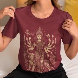 Hindu Goddess Durga T-shirt featuring a divine feminine design, perfect for spiritual lovers. Embrace the power of Durga with this occult mythology shirt. A unique dark goddess apparel piece for those who honor the sacred and mystical