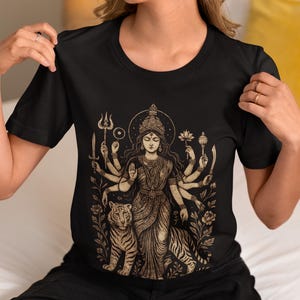 Hindu Goddess Durga T-shirt featuring a divine feminine design, perfect for spiritual lovers. Embrace the power of Durga with this occult mythology shirt. A unique dark goddess apparel piece for those who honor the sacred and mystical