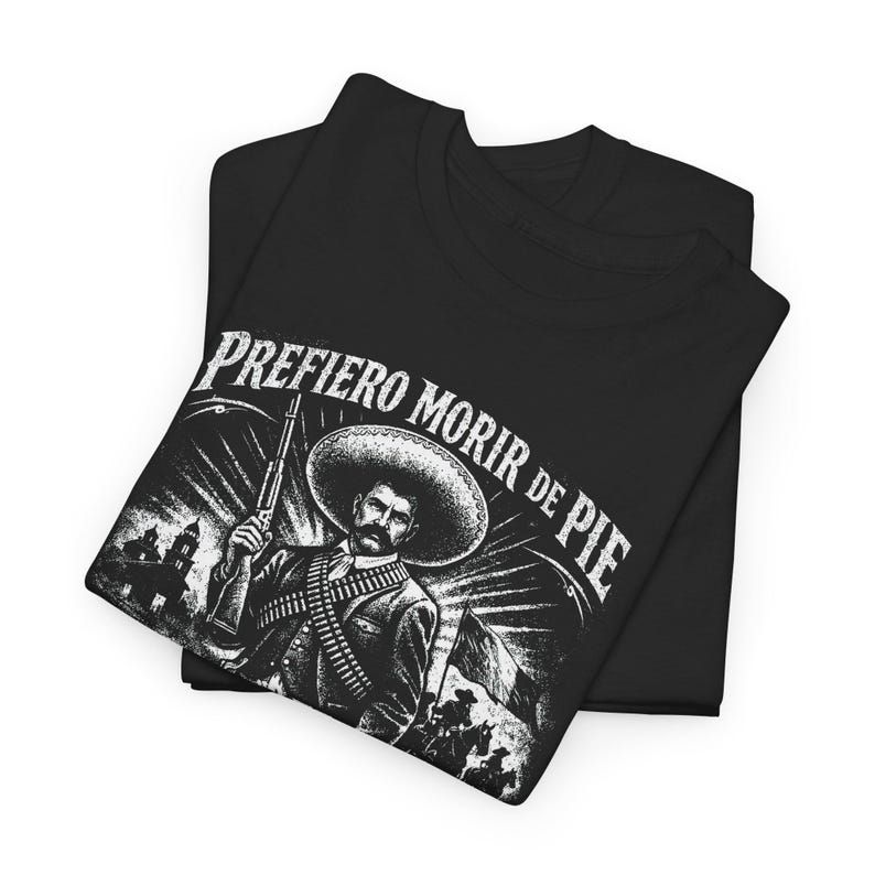 Emiliano Zapata unisex t-shirt featuring a powerful illustrated portrait of the Mexican revolutionary leader, inspired by the Mexican Revolution. This rebel spirit history shirt honors Emiliano Zapata’s fight for justice, land reform, and freedom, celebrating Latin heritage, revolutionary symbolism, and iconic Mexican history in a bold, striking design.