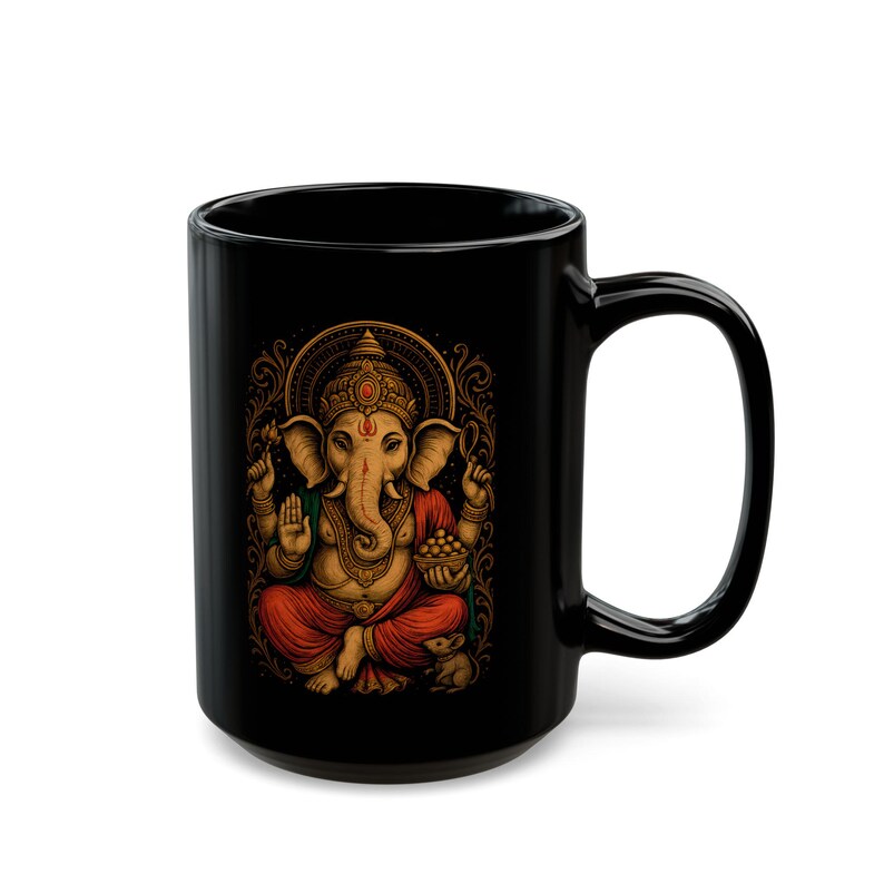Black Ganesha Mug featuring Hindu Elephant God design, perfect for yoga lovers and spiritual gifts. Boho Indian graphic print. Available in 11oz and 15oz sizes. Ideal for tea or coffee, a unique addition to your collection