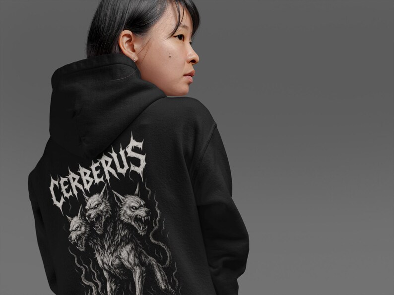 Cerberus Hoodie featuring a three-headed hellhound design inspired by Greek mythology. Gothic sweatshirt perfect for metalheads. Hades guardian graphic, ideal heavy metal gift for fans of dark fantasy and mythology