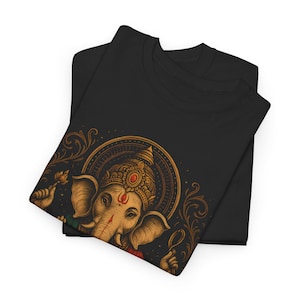 Spiritual Ganesha T-shirt featuring Hindu Elephant God design. Perfect for yoga, meditation, and spiritual gifts. Boho Indian graphic tee celebrating divine feminine energy and peaceful vibes.