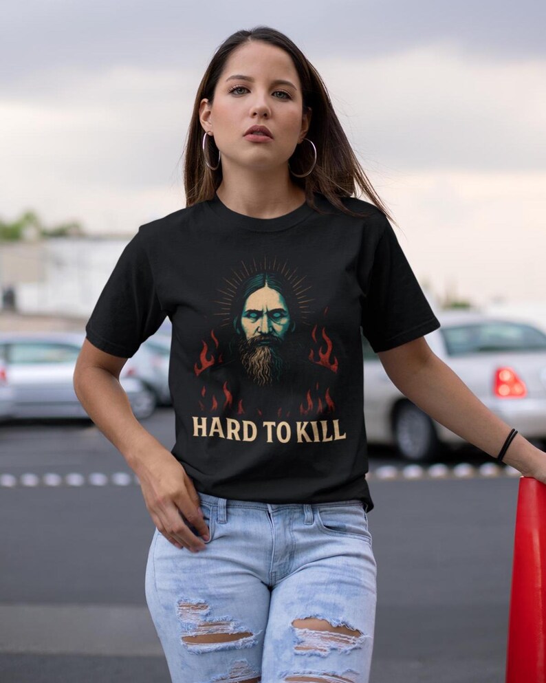 Mystical Rasputin t-shirt featuring a dark grunge occult illustration inspired by the legendary Russian mystic, with gothic aesthetic and esoteric symbolism. Funny dark humor shirt for history lovers, occult fans, and gothic style enthusiasts, designed with a vintage distressed look.