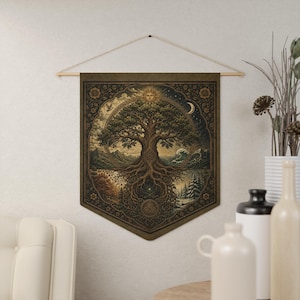 Tree of Life wall decor pennant featuring a vintage Celtic Tree of Life inspired by Yggdrasil with intricate sacred knotwork. Pagan altar wall hanging for Wiccan home decor, Norse mythology enthusiasts, Celtic spirituality, witchcraft spaces, meditation rooms, sacred altars, and nature-inspired spiritual gifts. Lightweight fabric tapestry with wooden dowel for easy hanging.