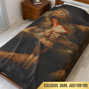 May include: A dark-toned blanket featuring a disturbing painting of a figure with a gaping mouth and exposed chest. The artwork is rendered in shades of brown, red, and black, with the text "EXCLUSIVE. DARK. JUST FOR YOU" in gold.
